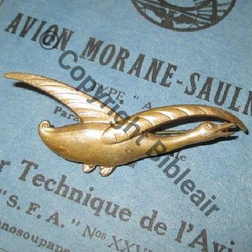 093 ressemble SPA.93  mais plutot bijou fantaisie  SM Eping bascule piston Dos lisse irreg 60x20mm Src.bellonte 80EurInv 